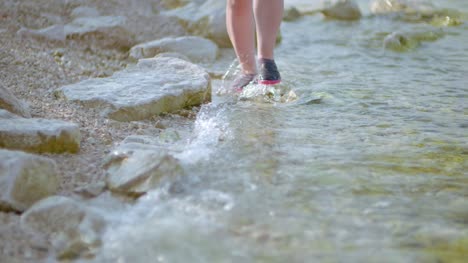 Woman-Walking-At-Seashore-In-Summer