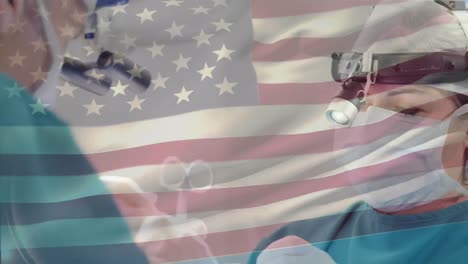 Animation-Der-Flagge-Der-USA,-Die-über-Chirurgen-Im-Operationssaal-Weht