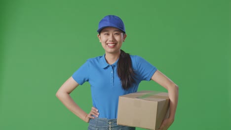 woman delivery person holding package