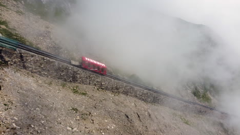 Aerial-of-Niesen-Funicular-Moving-Through-Picturesque-Swiss-Terrain