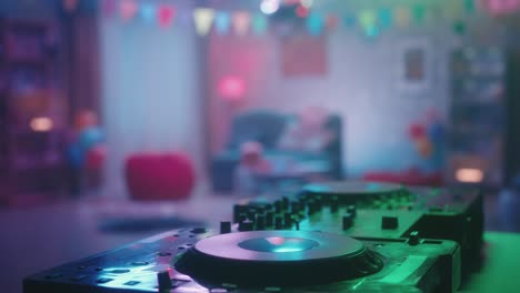 blurred interior dj setup at a party