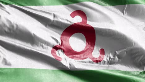 la bandera textil de ingushetia se agita lentamente en el bucle del viento. el estandarte de ingushetia se balancea suavemente en la brisa. fondo de relleno completo. bucle de 20 segundos.