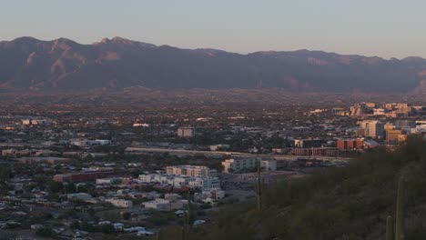 tucson arizona downtown city skyline aerial with mountains at sunset