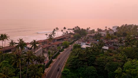 stunning aerial footage capturing the breathtaking weligama coastline bathed in the warm hues of sunset.