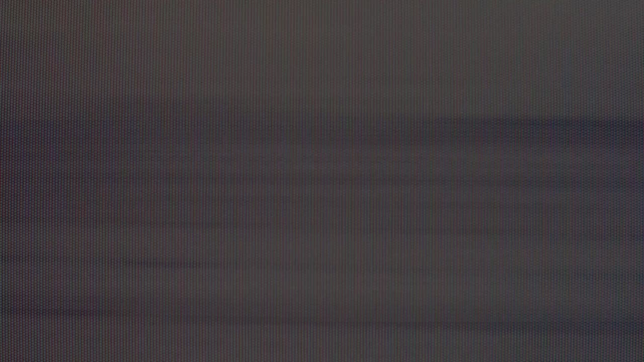 Authentic VHS tape noise with color bleeding, scan lines, and static glitch effects. Seamless loop for creating a retro 80s or 90s television look. Use as an overlay or background