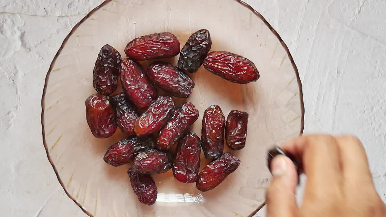 Close up of many date fruit on table
