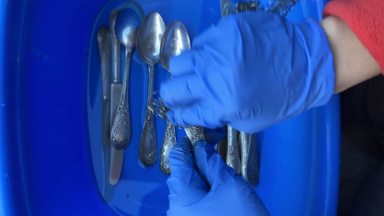 Cleaning Antique Silverware with Gloves