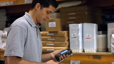 worker scanning products with a barcode scanner