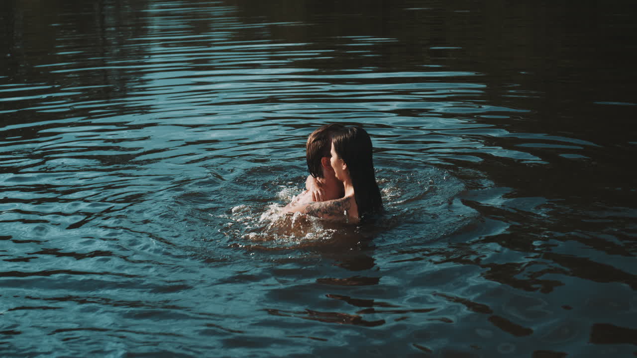 Couple Kissing in the Lake