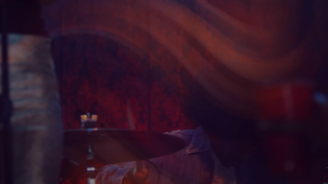 Light streaks revealing male drummer playing drum kit for music, animated trails accenting strikes