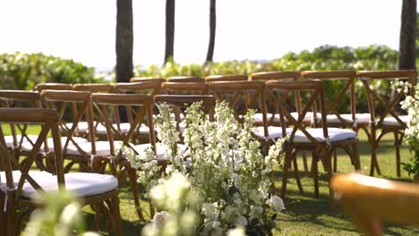 wedding ceremony flower slider shot aisle chairs