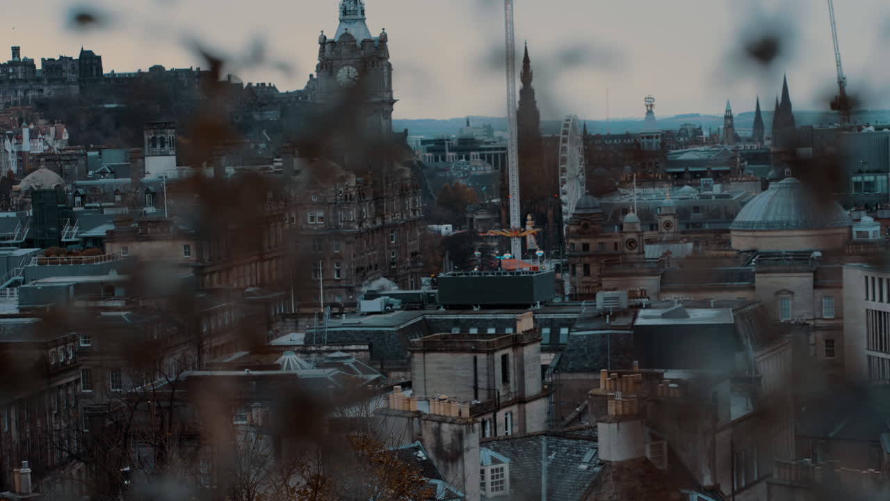 Slow Motion Panning Shot of Edinburgh Cityscape from Calton Hill with Foreground Branches – Daytime Cinematic View