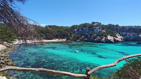 cala macarella its waters are an intense turquoise color, ideal for swimming