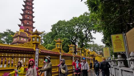 tourists exploring historic buddhist pagoda