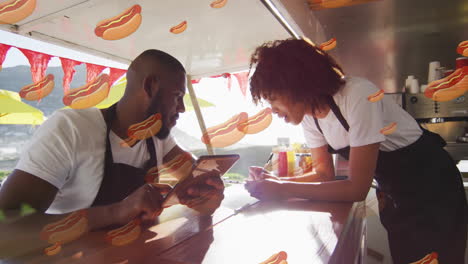 hot dog animation over two food truck workers discussing orders