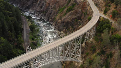 aerial flyover of the two pulga bridges crossing north fork feather river