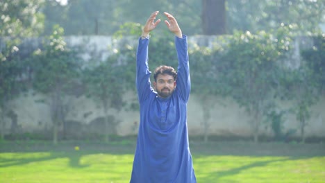indian man doing full body stretch