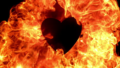 flame of fire burning around a black heart