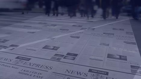 People-walking-fast-with-newspaper-in-the-background