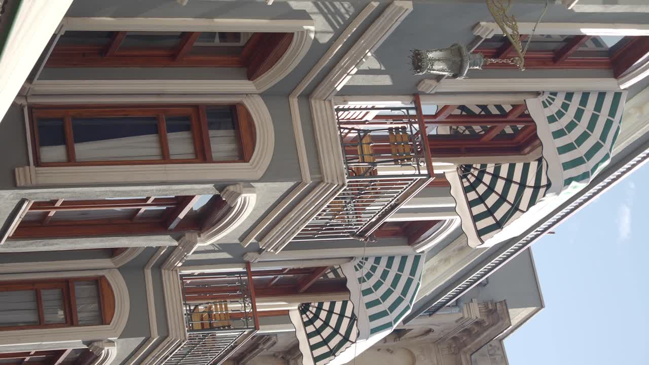 Building with balconies and awnings