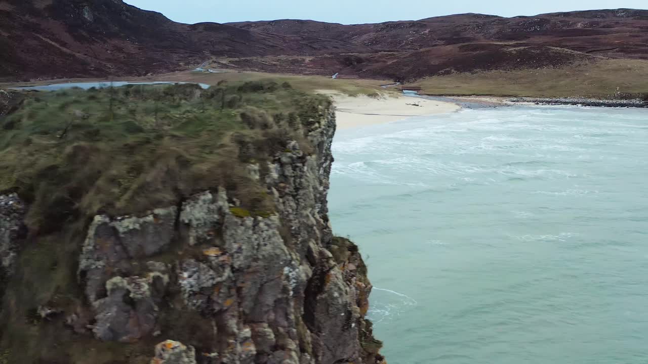 Drone shot panning from Garry beach in Tolsta to a close up of a sea stack
