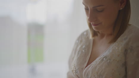 pregnant woman bonding with baby