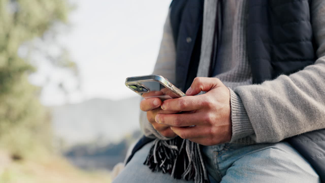 Closeup, outdoor and hands with a smartphone