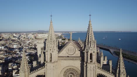 Fly-Over-Gothic-Architecture-Of-The-Cathedral-Of-Santa-Maria-of-Palma-In-Mallorca,-Spain