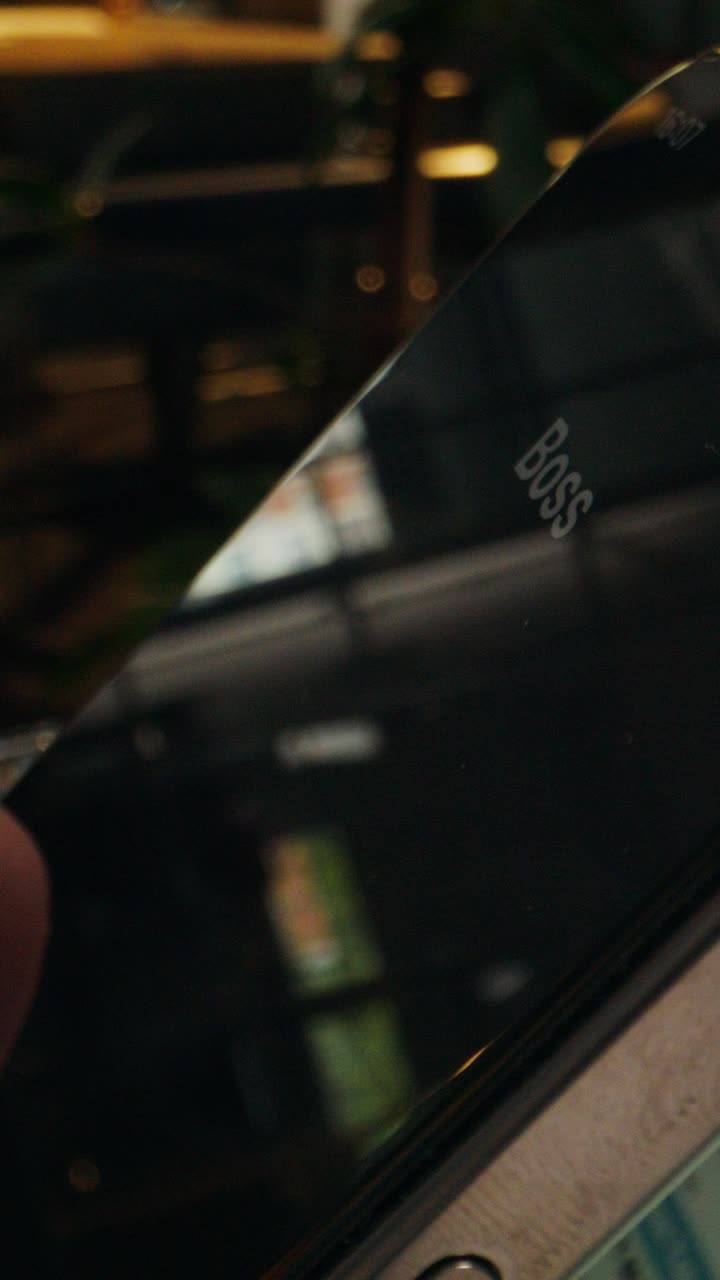 Smartphone and Laptop at a Cafe