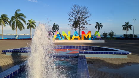 panama city landmark sign and fountain in cinta costera oceanfront park, slow motion