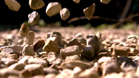 pebbles falling onto more pebbles