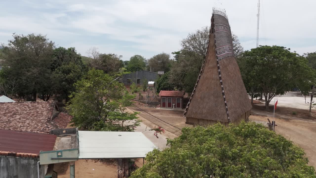 Drone footage of a traditional Bahnar house near Kon Tum in central highland Vietnam. Easy to recognize with the tall wooden roof
