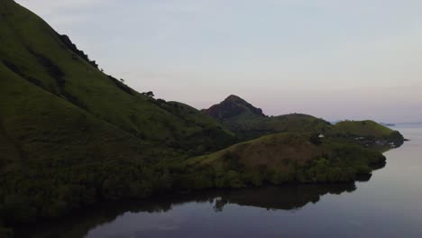 Beautiful-Island-Coastline-of-Komodo,-Indonesia-at-Sunset---Aerial-Drone-Flight