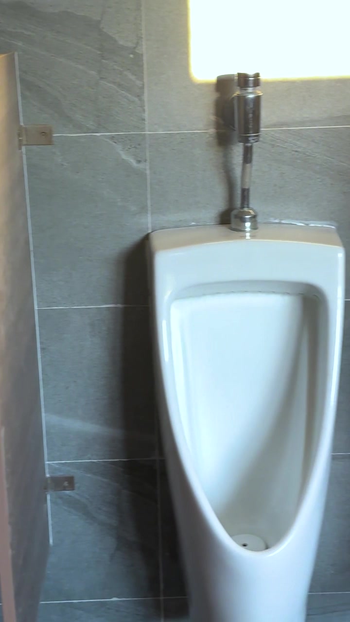 Urinals in a public male restroom