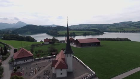 aerial flight around the church, hautville village, switzerland