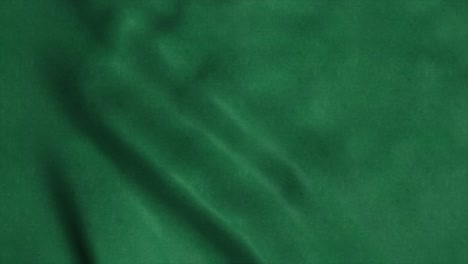 waving green flag animation seamless loop. green background flag video waving in wind