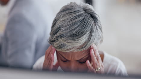 stress, headache and senior woman at computer
