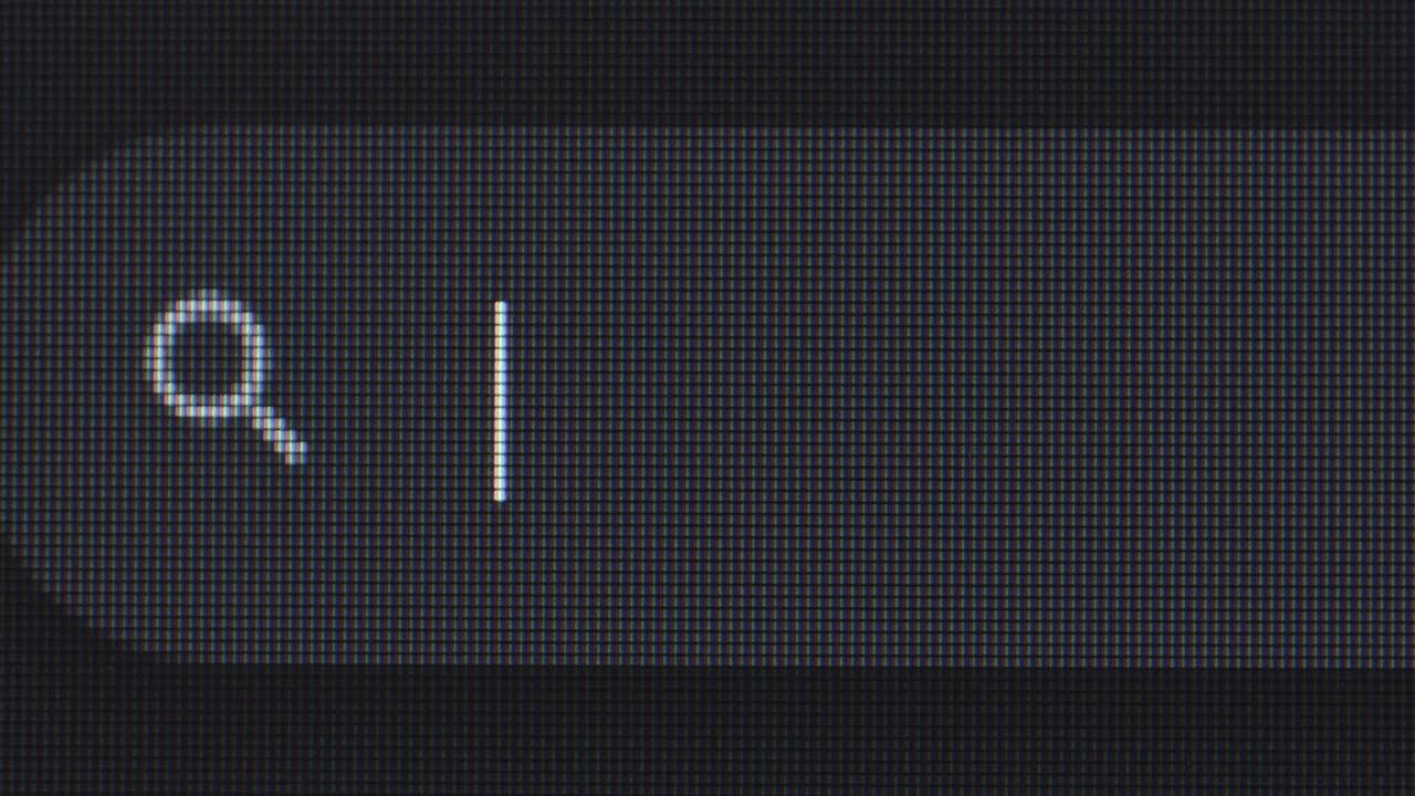 Close-up of a computer screen displaying "How to use AI" text.