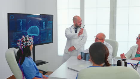 Female-nurse-wearing-scaning-headset-for-brain-activity