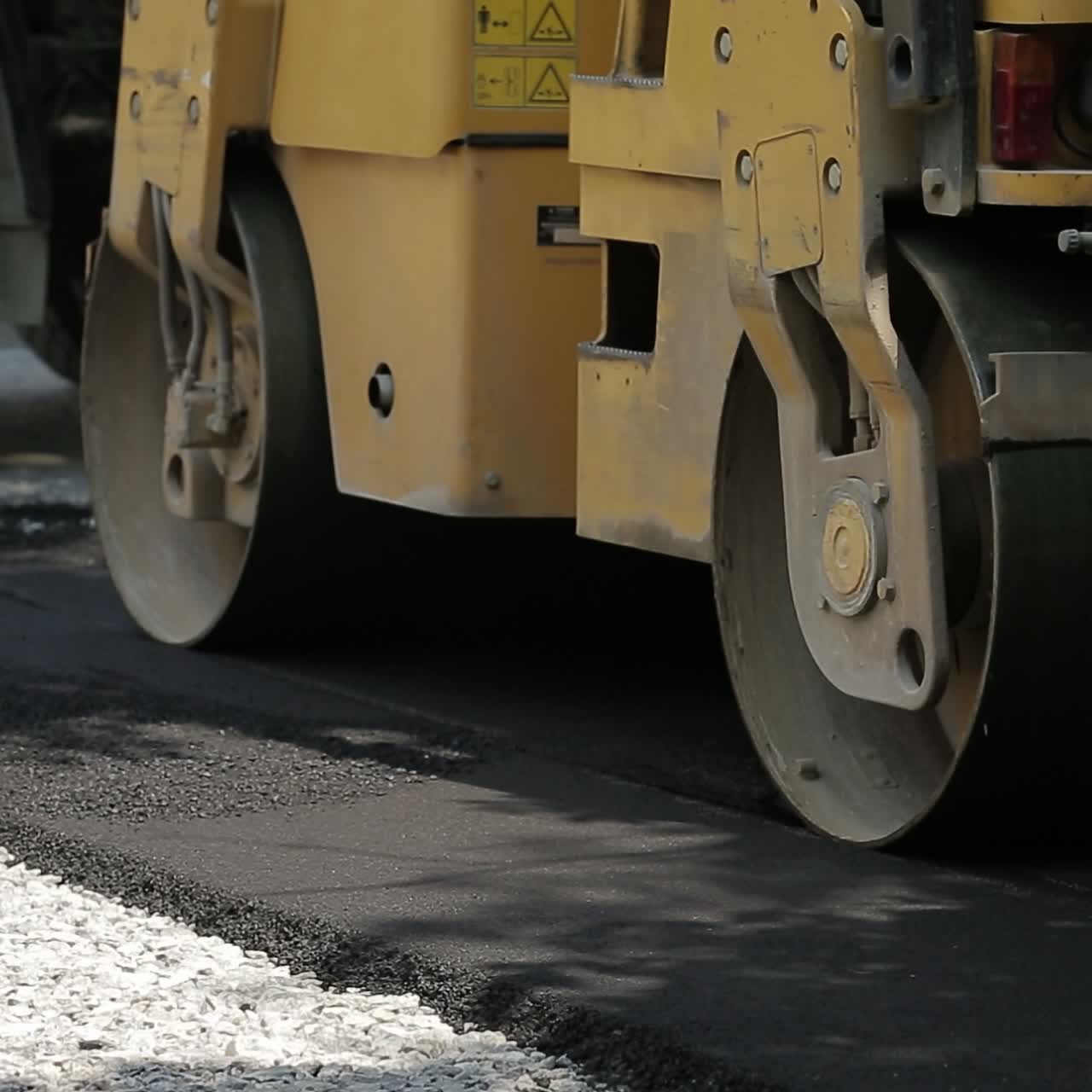 Laying Asphalt With Road Construction
