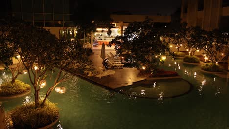 peaceful garden illuminated by warm lights at night