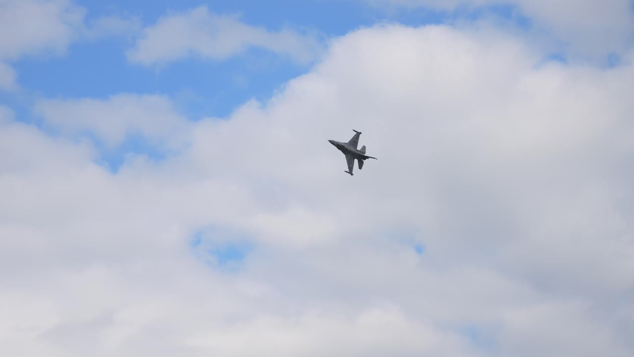 FA18 aircraft flies through the air in slow motion while shooting flares. Airpower 2024