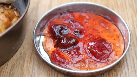 strawberry jam in small dish