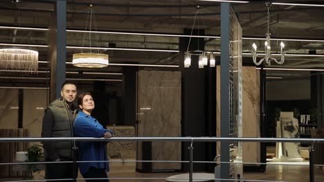 couple browsing interior design showroom