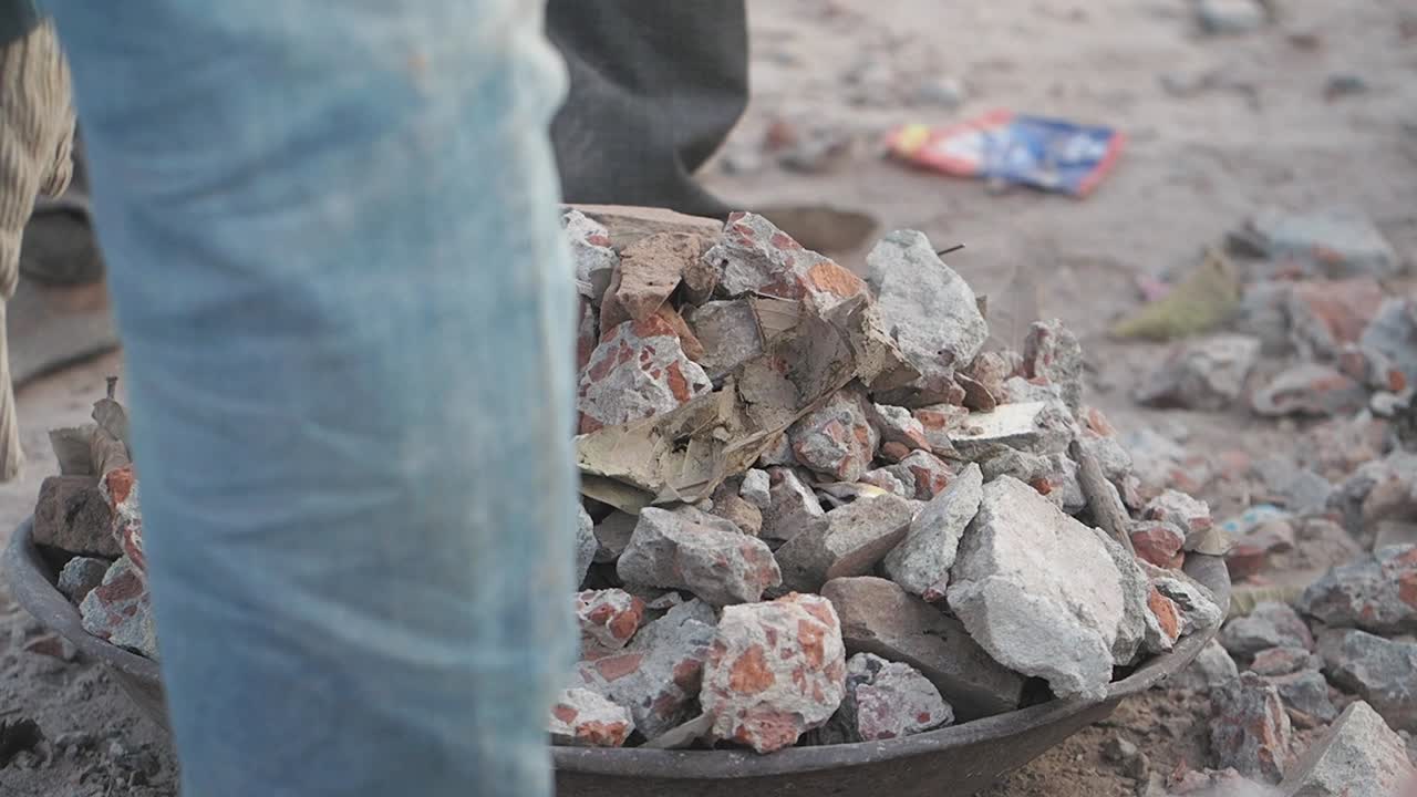 Workers Handling Demolition Debris