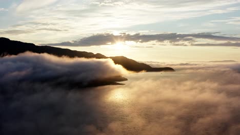 Reflection-Of-Sunlight-At-Sunset-On-The-River-With-Mountains-On-The-Background