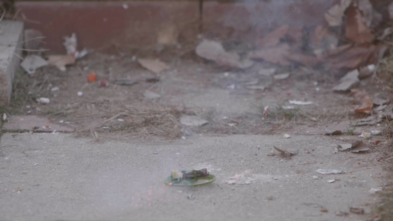 lighting a firework on New Years day and it goes off and propels itself into the air