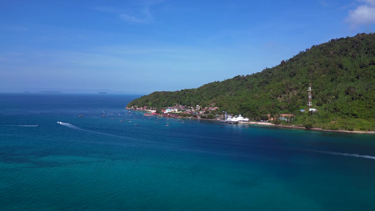 Islamic white mosque at beach on Perhentian Island