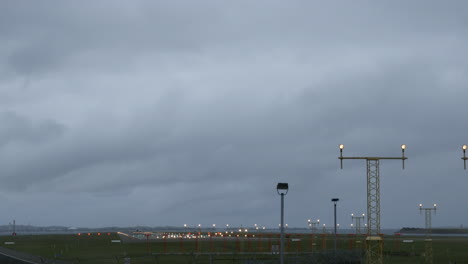 plane taking off at sydney airport australia in gray-stormy weather shot in 4k high resolution