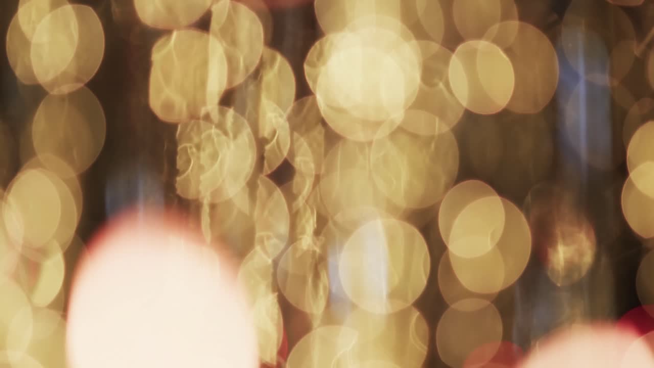 video de puntos de luz bokeh amarillos parpadeantes con espacio de copia